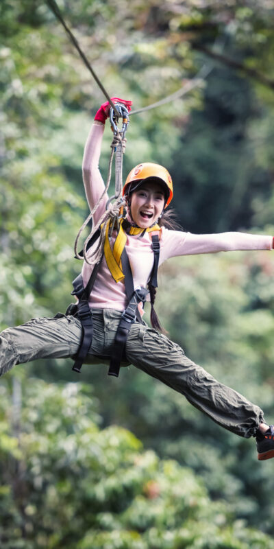 woman-tourist-wearing-casual-clothing-zip-line-canopy-experience-laos-rainforest-asia Woman Tourist Wearing Casual Clothing On Zip Line Or Canopy Experience In Laos Rainforest, Asia